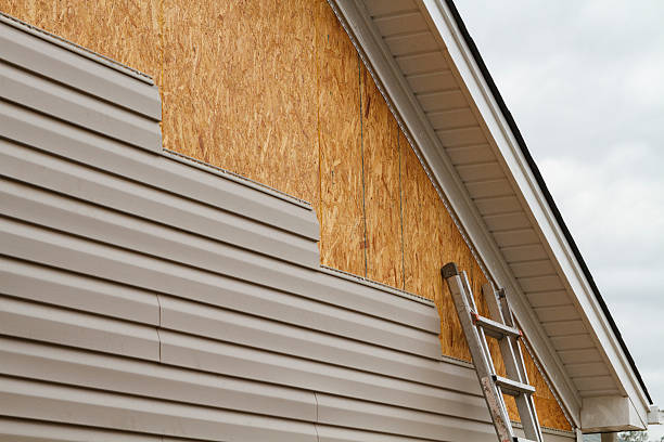 Professional Siding Installation technician working in Wellsburg, WV